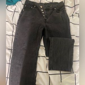 Black asymmetrical jeans